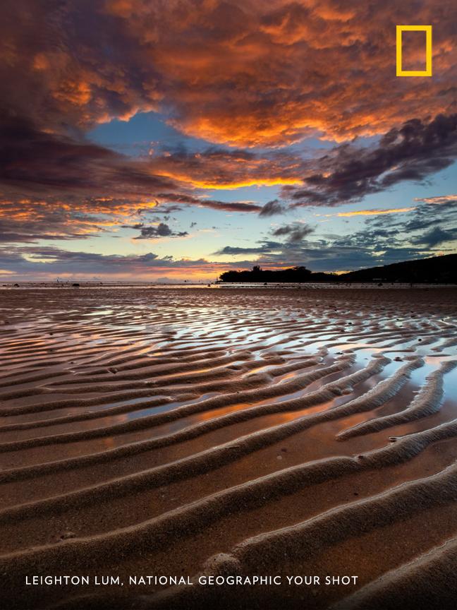 "Got to the beach at super low tide and found these great leading lines!" writes Your Shot photographer Leighton Lum. "The sun started to go down and the sky started to glow!" https://on.natgeo.com/2JP4mKu