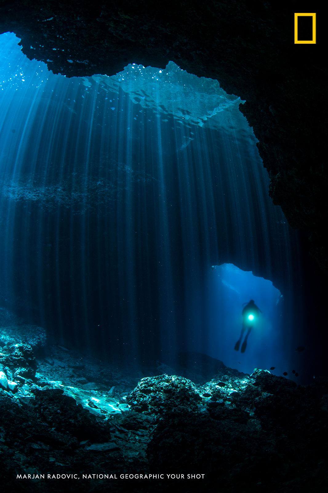 To describe his photo from Croatia, Your Shot photographer Marjan Radovic shared a quote from Jacques Yves Cousteau: "From birth, man carries the weight of gravity on his shoulders. He is bolted to Earth. But man has only to sink beneath the surface and he is free..." https://on.natgeo.com/31OQchC